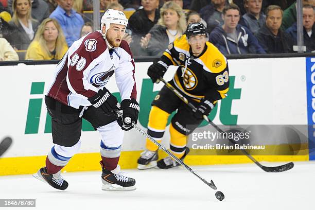 Ryan O'Reilly of the Colorado Avalanche skates with the puck against the Boston Bruins at the TD Garden on October 10, 2013 in Boston, Massachusetts.