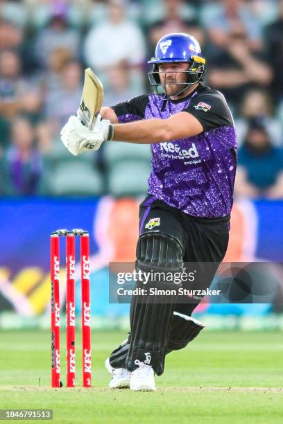 Corey Anderson of the Hurricanes plays a pull shotduring the BBL match between Hobart Hurricanes and Sydney Sixers at University of Tasmania Stadium,...