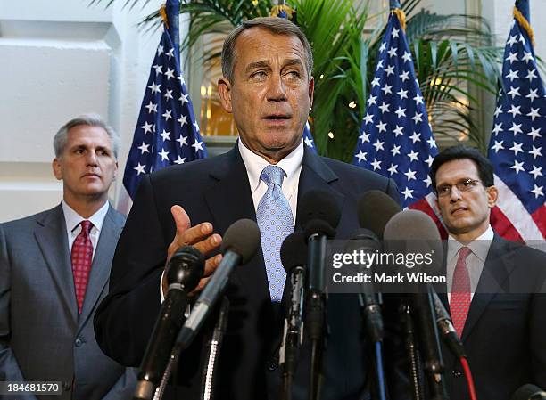 House Speaker John Boehner speaks to the media while flanked by House Majority Leader Eric Cantor and Rep. Kevin McCarthy following a House...