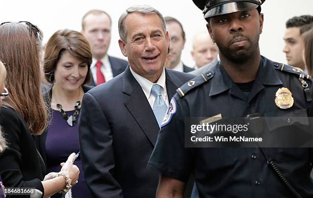 Speaker of the House Rep. John Boehner arrives at a press conference followiong a meeting of House Republicans at the U.S. Capitol October 15, 2013...