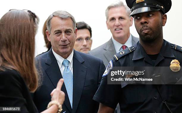 Speaker of the House Rep. John Boehner arrives at a press conference followiong a meeting of House Republicans at the U.S. Capitol October 15, 2013...