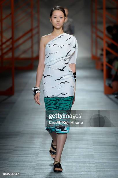 Model showcases designs on the runway during the Missoni show as part of Mercedes Benz Fashion Week Tokyo S/S 2014 at Hikarie Hall A of Shibuya...