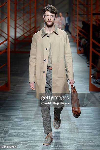 Model showcases designs on the runway during the Missoni show as part of Mercedes Benz Fashion Week Tokyo S/S 2014 at Hikarie Hall A of Shibuya...