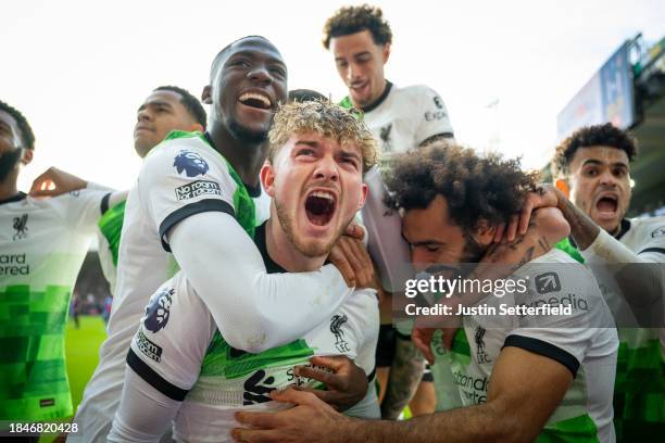 Harvey Elliott of Liverpool celebrates with Mo Salah and Ibrahima Konate after scoring his team's second goal during the Premier League match between...