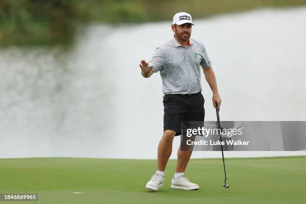 Louis Oosthuizen of South Africa acknowledges the crowd following a birdie putt on the 15th green on Day Five of the Alfred Dunhill Championship at...