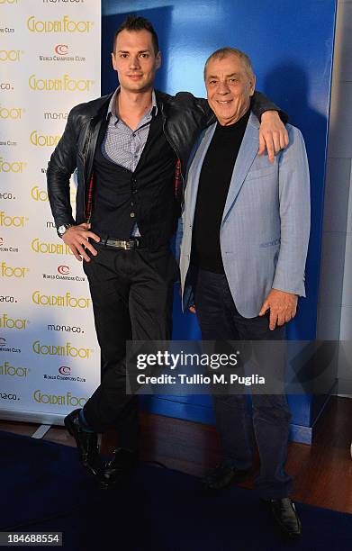 Antonio Caliendo and Michele Caliendo pose for photographers at Monte-Carlo Bay prior to the 2013 Golden Foot Award on October 15, 2013 in...