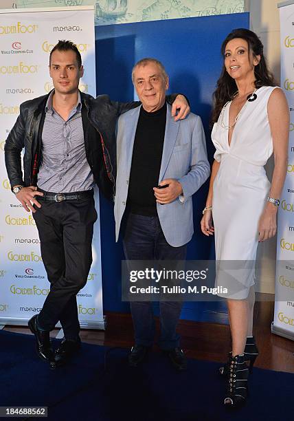 Michele Caliendo, Antonio Caliendo and Lorena Baricalla pose for photographers at Monte-Carlo Bay prior to the 2013 Golden Foot Award on October 15,...