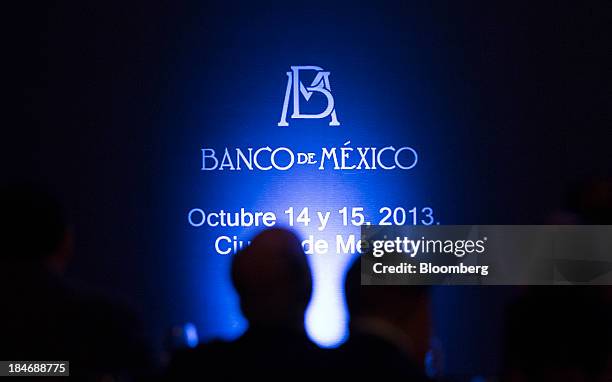 Attendees wait for the start of the Banco de Mexico 20th Anniversary Of Independence Conference in Mexico City, Mexico, on Tuesday, Oct. 15, 2013....