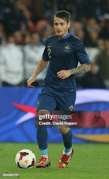 Mathieu Debuchy of France runs with the ball during the International Friendly match between France and Australia at Parc des Princes on October 11,...