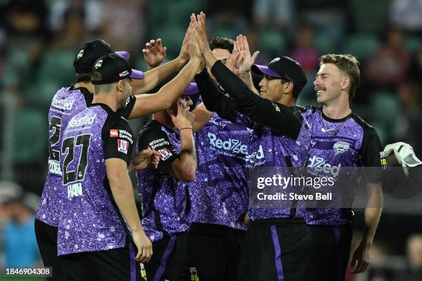 Riley Meredith of the Hurricanes celebrates the wicket of James Vince of the Sixers during the BBL match between Hobart Hurricanes and Sydney Sixers...