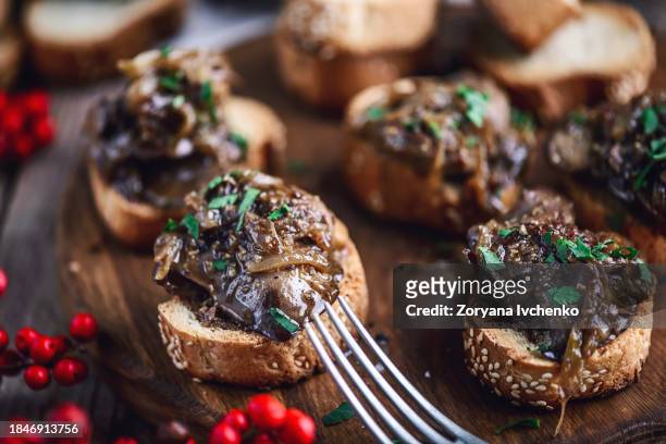 rabbit liver crostini appetizer - offal stock pictures, royalty-free photos & images
