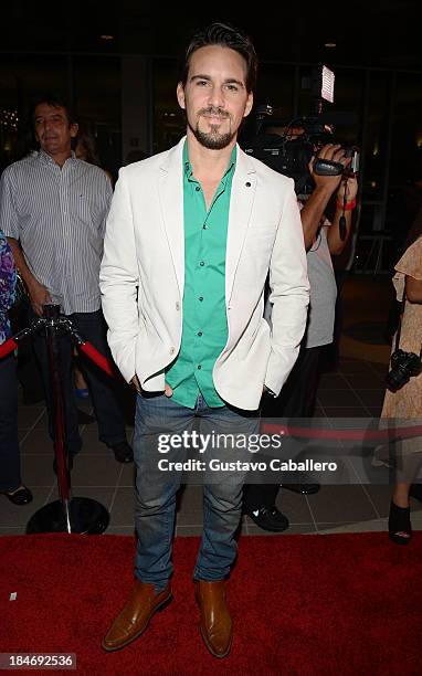 Leonardo Reyes arrives for the premiere of "The Snitch Cartel" at Regal South Beach on October 14, 2013 in Miami, Florida.