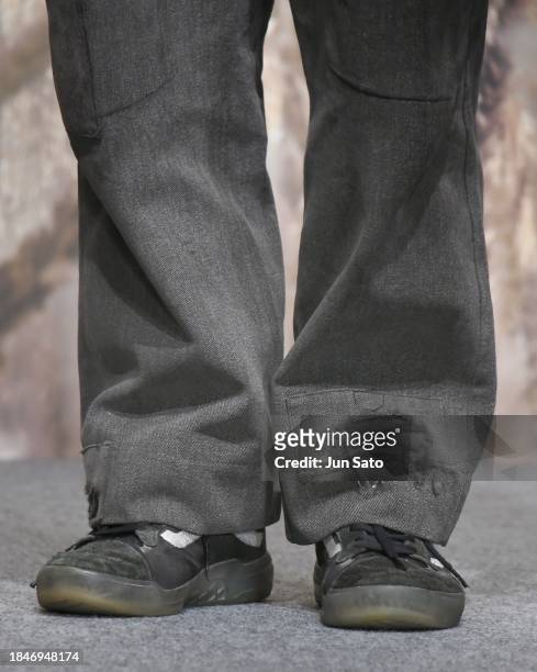 Director Zack Snyder, detail of embroidery on the hem of pants, attends the "Rebel Moon: Part One - A Child of Fire" Press Conference on December 11,...