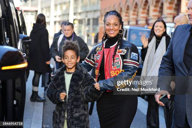 Alicia Keys with her son leaving a performance on the piano at St Pancras International Station at Kings Cross on December 11, 2023 in London,...