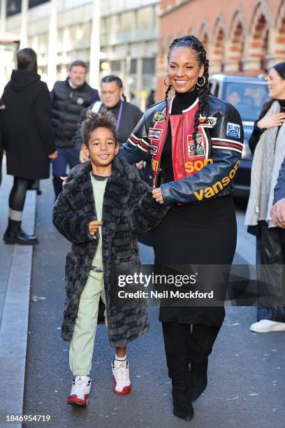 Alicia Keys with her son leaving a performance on the piano at St Pancras International Station at Kings Cross on December 11, 2023 in London,...