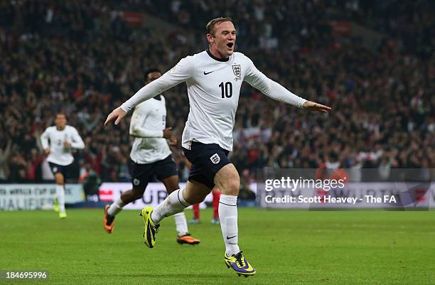 Wayne Rooney of England celebrates scoring their first goal during the FIFA 2014 World Cup Qualifying Group H match between England and Poland at...