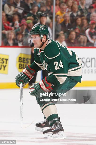 Matt Cooke of the Minnesota Wild skates against the Winnipeg Jets during the game on October 10, 2013 at the Xcel Energy Center in St. Paul,...