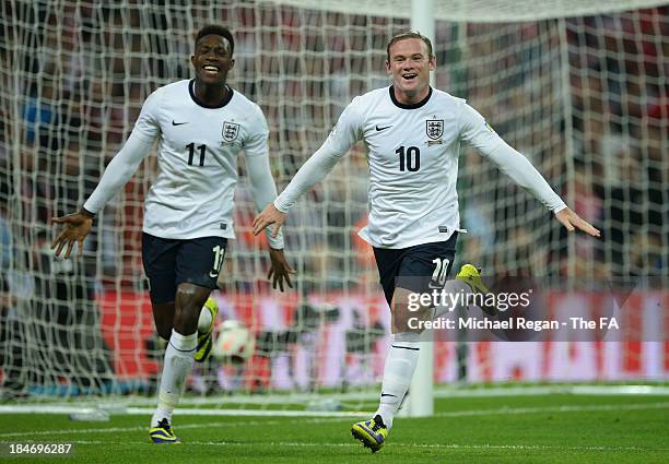 Wayne Rooney of England celebrates scoring their first goal with Danny Welbeck of England during the FIFA 2014 World Cup Qualifying Group H match...