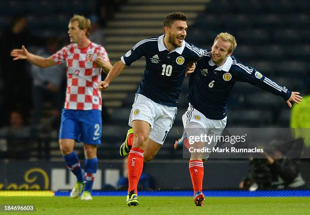 Robert Snodgrass of Scotland celebrates his goal with Barry Bannan during the FIFA 2014 World Cup Qualifying Group A match between Scotland and...