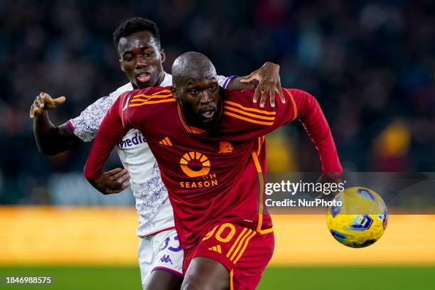 Romelu Lukaku of AS Roma and Michael Kayode of ACF Fiorentina compete for the ball during the Serie A match between AS Roma and ACF Fiorentina at...