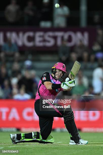 Daniel Hughes of the Sixers bats during the BBL match between Hobart Hurricanes and Sydney Sixers at University of Tasmania Stadium, on December 11...