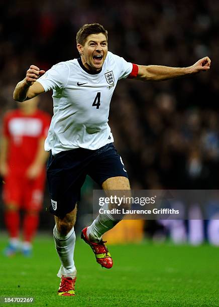 Steven Gerrard of England celebrates as he scores their second goal during the FIFA 2014 World Cup Qualifying Group H match between England and...