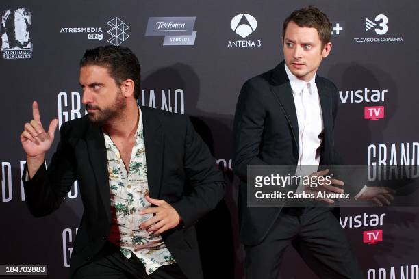 Spanish director Eugenio Mira and actor Elijah Wood attend "Grand Piano" premiere at the Callao cinema on October 15, 2013 in Madrid, Spain.