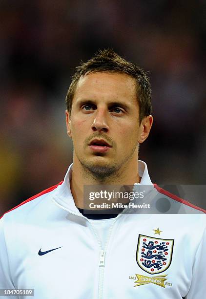 Phil Jagielka of England lines up for the national anthem prior to kickoff during the FIFA 2014 World Cup Qualifying Group H match between England...