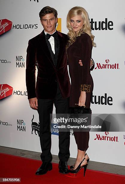 Pixie Lott and Oliver Cheshire attend the Attitude Magazine awards at Royal Courts of Justice, Strand on October 15, 2013 in London, England.