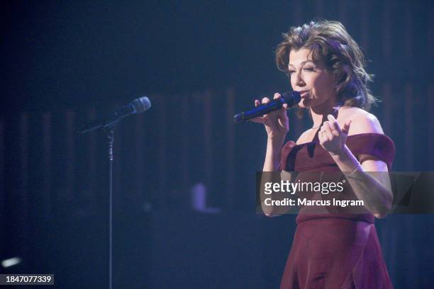 Amy Grant performs on stage during the Christmas Live concert at Smart Financial Centre on December 10, 2023 in Sugar Land, Texas.