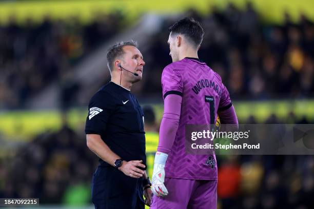 Referee Oliver Langford speaks to Freddie Woodman of Preston North End during the Sky Bet Championship match between Norwich City and Preston North...
