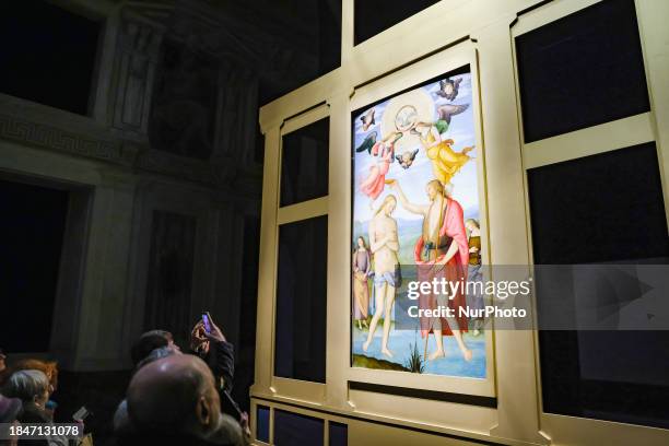 General view of the Baptism of Christ by Perugino is being displayed at the Christmas exhibition at Palazzo Marino in Milan, Italy, on December 14,...