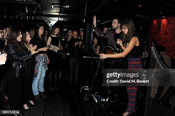 Jack Gourlay and Sophie-Rose Harper of The Night VI perform at the Roger Vivier Virgule London launch party hosted by Atlanta de Cadenet, Ines de la...