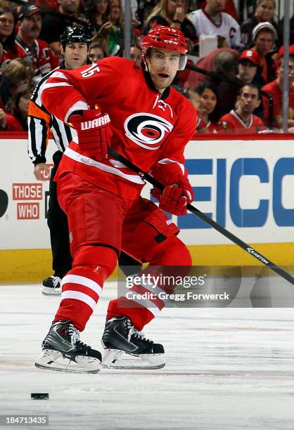 Tuomo Ruutu of the Carolina Hurricanes eyes the puck during an NHL game against the Chicago Blackhawks at PNC Arena on October 15, 2013 in Raleigh,...