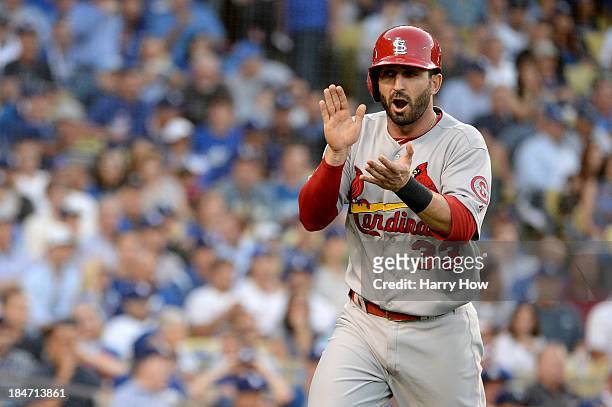 Daniel Descalso celebrates after he scores in the third inning against the Los Angeles Dodgers in Game Four of the National League Championship...