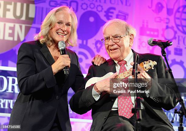 Glenn Close and Warren Buffett perform onstage at FORTUNE Most Powerful Women Summit on October 15, 2013 in Washington, DC.