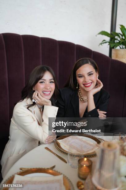 Catriona Gray , Miss Universe 2018 and actress Heart Evangelista , are seen during the Dior Carousel of Dreams Launch Event in Manila, on November...