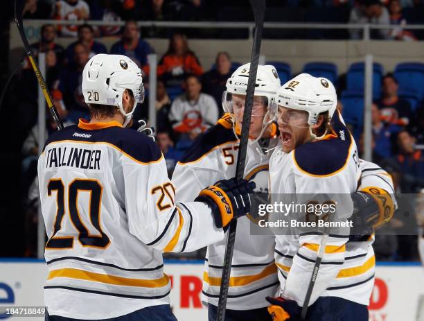 The Buffalo Sabres celebrate a game tying goal at 17:59 of the third period by Marcus Foligno against the New York Islanders at the Nassau Veterans...