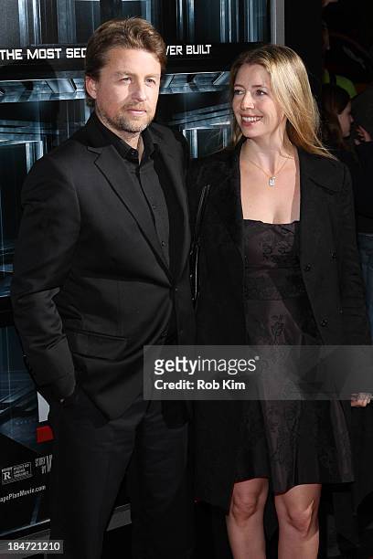 Director Mikael Hafstrom and guest attend "Escape Plan" New York Premiere at Regal E-Walk on October 15, 2013 in New York City.