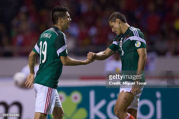 Oribe Peralta of Mexico celebrates after scoring during a match between Costa Rica and Mexico as part of the CONCACAF Qualifiers at National Stadium...