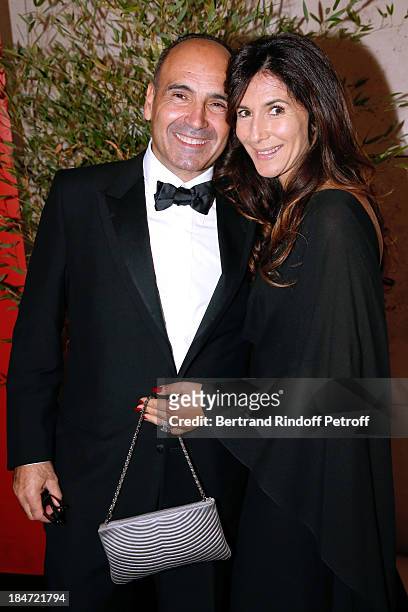 Philippe Journau and his wife attend AROP Gala at Opera Bastille with a representation of 'Aida' on October 15, 2013 in Paris, France.
