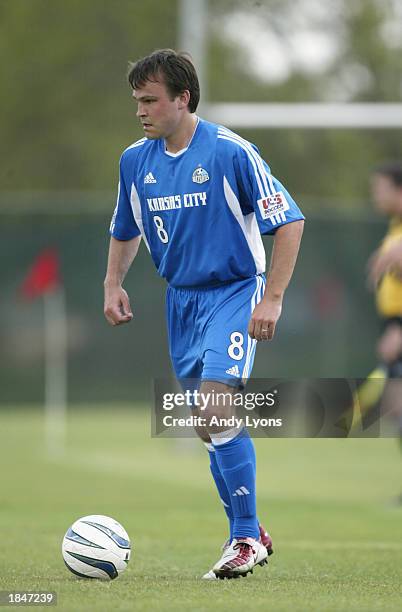 Chris Brown of the Kansas City Wizards dribbles the ball against the New York/New Jersey MetroStars during the MLS game on March 7, 2003 at the...