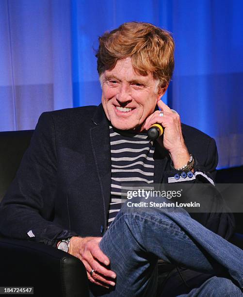 Actor Robert Redford speaks to the audience at an official Academy members screening of "All Is Lost" hosted by The Academy Of Motion Picture Arts...