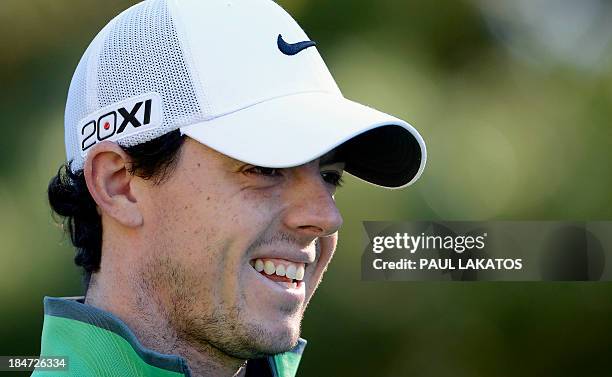 Rory Mcilroy of Northern Ireland smiles on the course during the Pro-Am competition of the Kolon Korea Open at Woo Jeong Hills Country Club near...