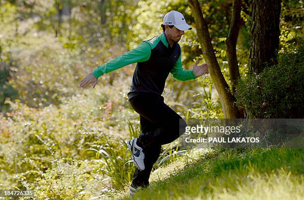 Rory Mcilroy of Northern Ireland runs up the 2nd green steps to the 3rd tee box during the Pro-Am competition of the Kolon Korea Open at Woo Jeong...