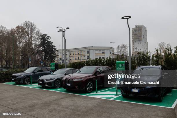 Four BMW's electric cars are pictured during the inauguration of an Atlante electric vehicle charging station, located at CityLife district, on...