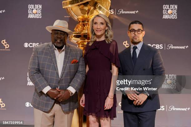 Cedric the Entertainer, Helen Hoehne and Wilmer Valderrama pose onstage during the 81st Golden Globe Awards nominations announcement at The Beverly...