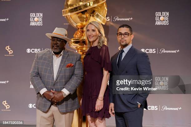 Cedric the Entertainer, Helen Hoehne and Wilmer Valderrama pose onstage during the 81st Golden Globe Awards nominations announcement at The Beverly...