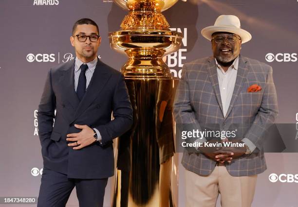 Wilmer Valderrama and Cedric the Entertainer pose onstage during the 81st Golden Globe Awards nominations announcement at The Beverly Hilton on...