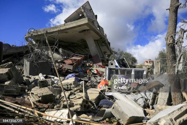 Picture taken on December 14, 2023 shows a destroyed house following Israeli bombardment during the past week, on the southern Lebanese village of...